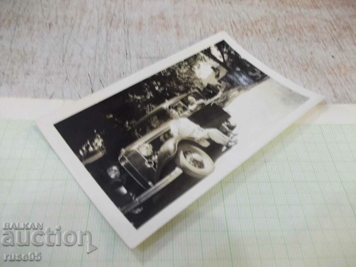 Auction Old photo of a family in front of a house next to the car Auction Old photo of a family in front of a house next to the car