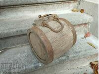 Old wooden bucket, pavur for water