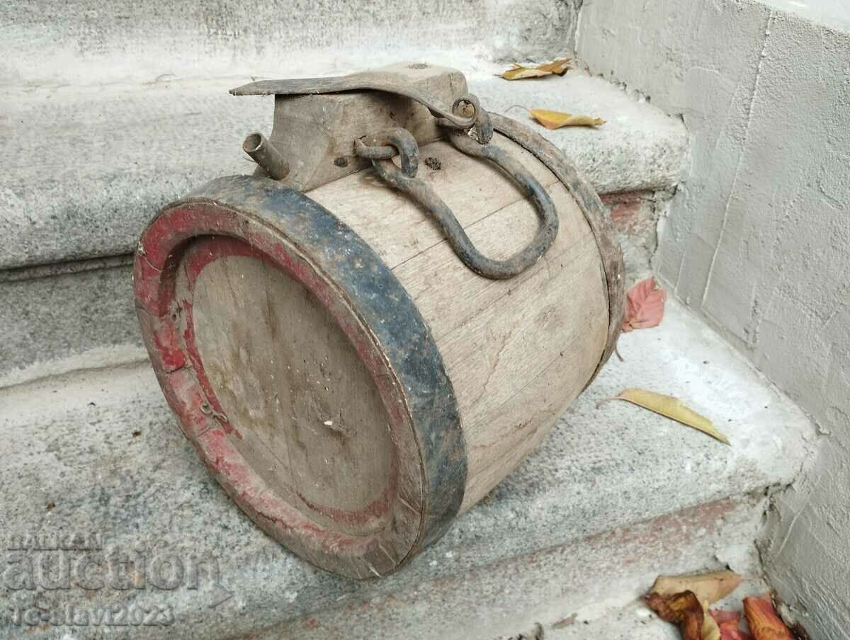 Old wooden bucket, pavur for water