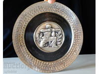 Farfurie de staniu, panou Săgetător, Vânător