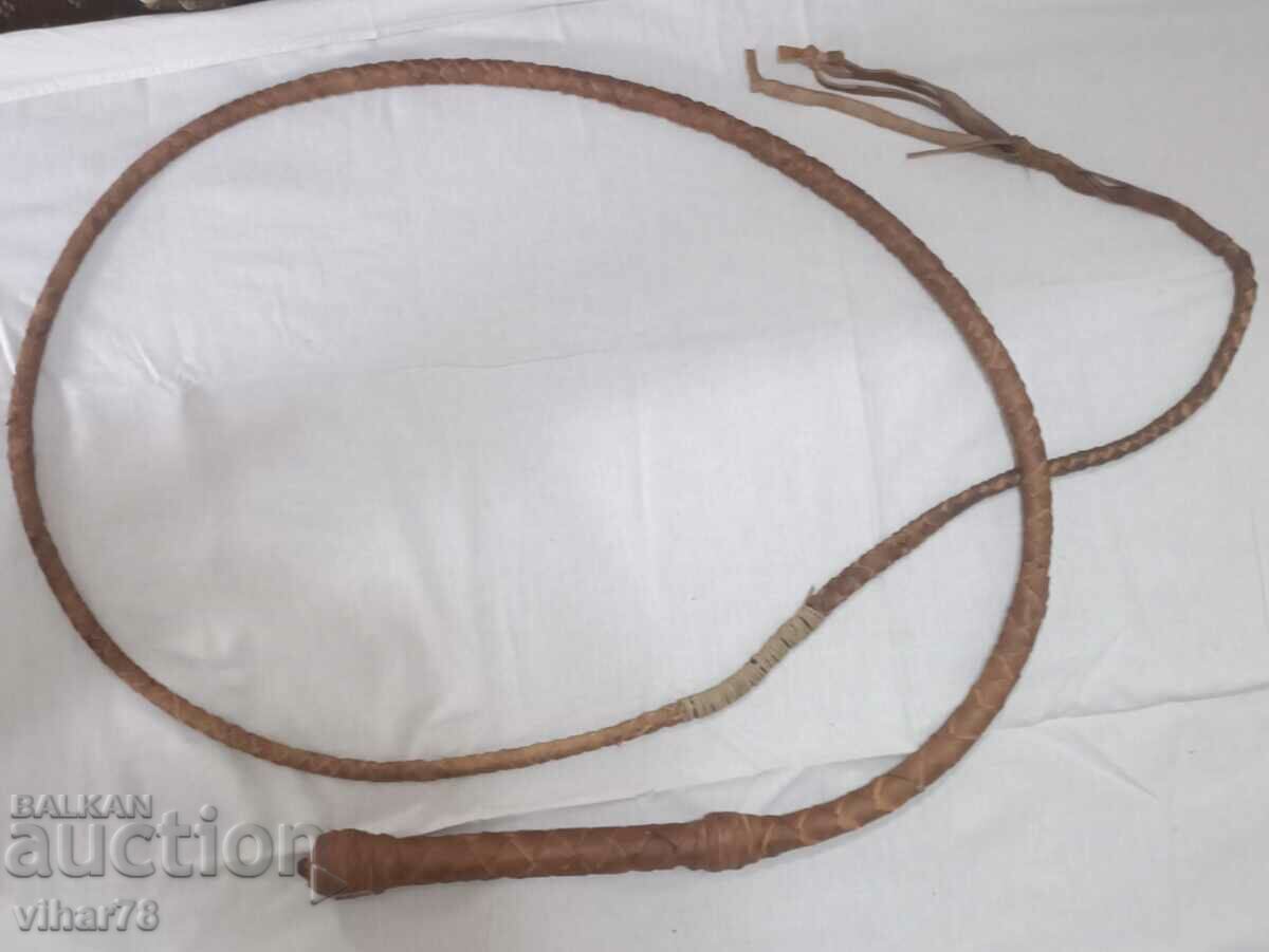 Auction A LEATHER WHIP Auction A LEATHER WHIP