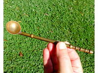 Brass cocktail spoon.