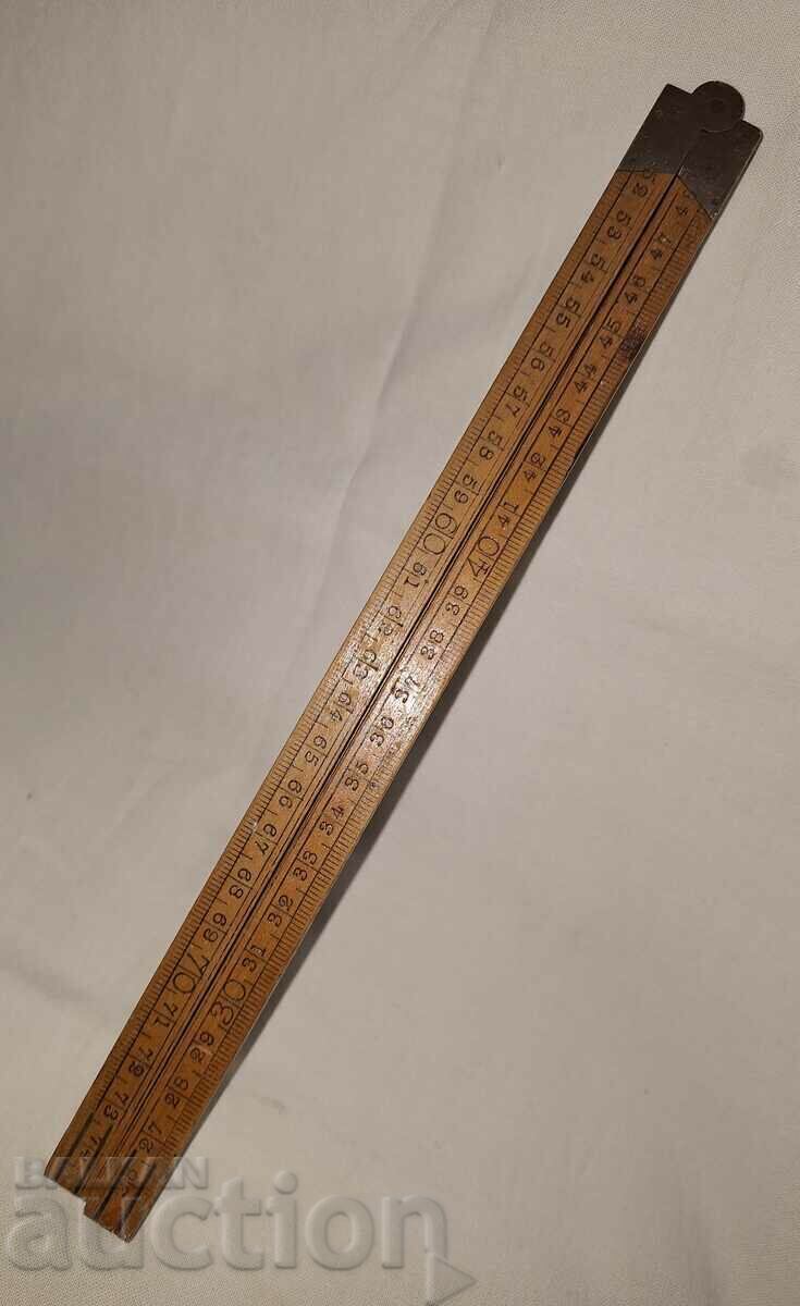 Delivery of Old folding tape measure--100 cm.--wood bronze Delivery of Old folding tape measure--100 cm.--wood bronze