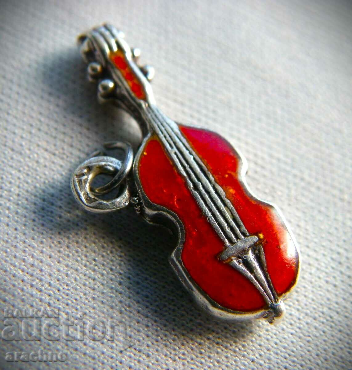 "Professional" silver locket with enamel with price 30.00 BGN | € 15.34 "Professional" silver locket with enamel with price 30.00 BGN | € 15.34