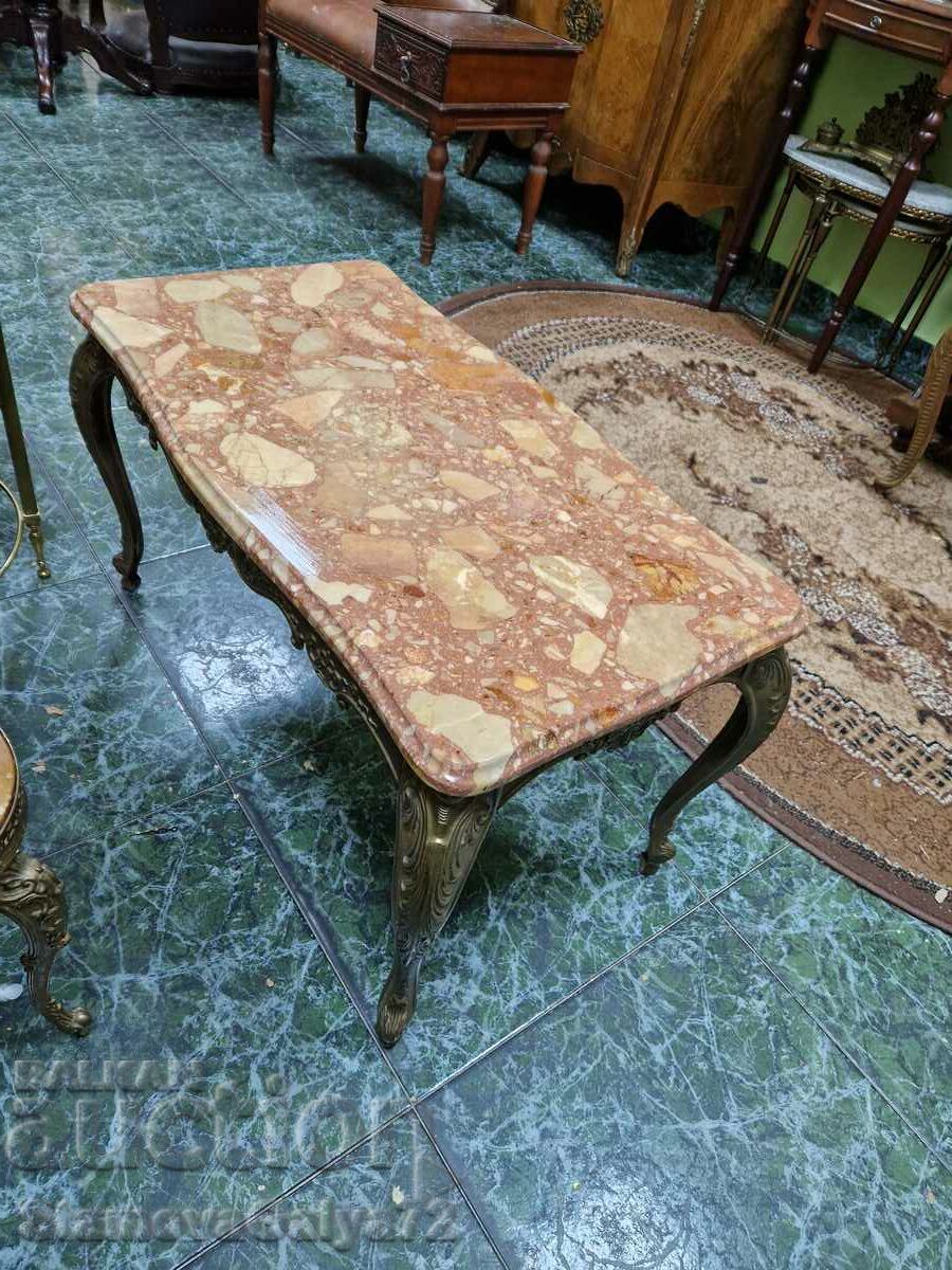 Auction A wonderful antique bronze coffee table with a marble top Auction A wonderful antique bronze coffee table with a marble top