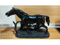 Old metal statuette, horse