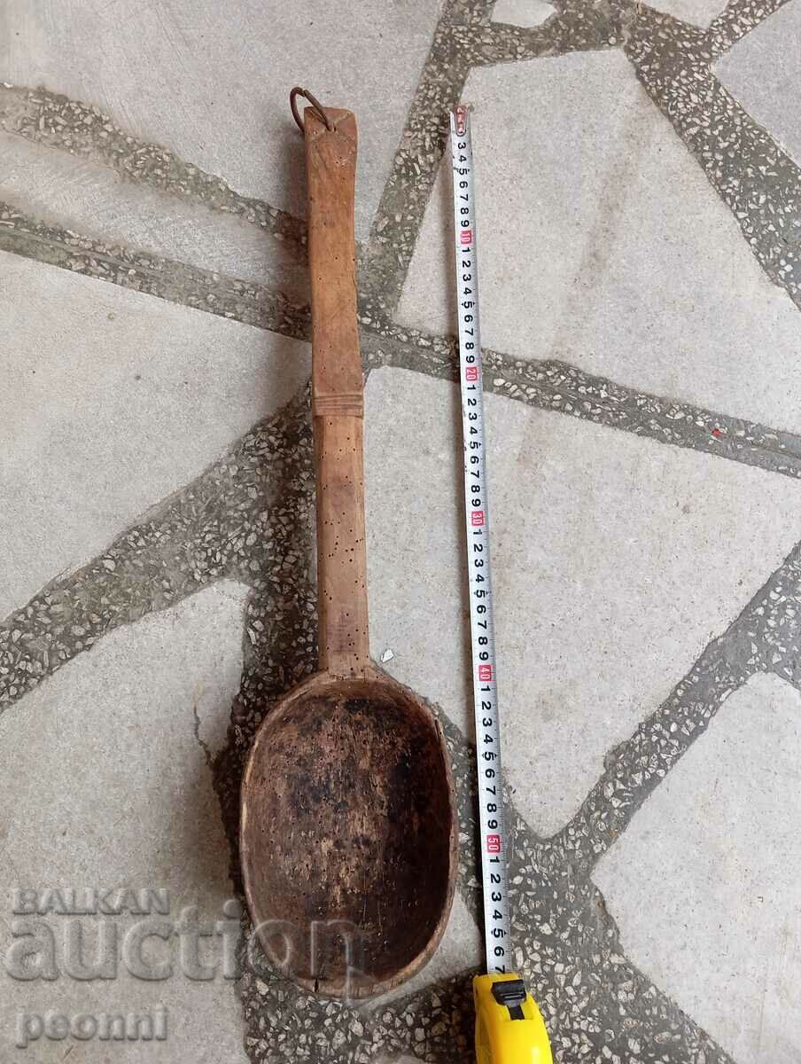 A very old and huge spoon