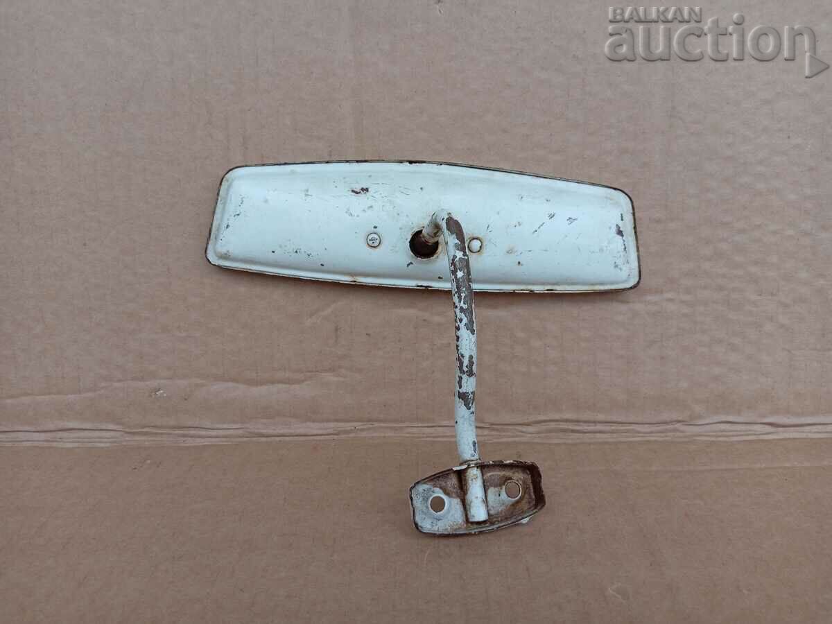 Delivery of antique mirror from a vintage car