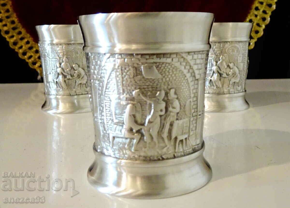 Three pewter cups with relief pictures Wedding. with price 75.00 BGN | € 38.35 Three pewter cups with relief pictures Wedding. with price 75.00 BGN | € 38.35