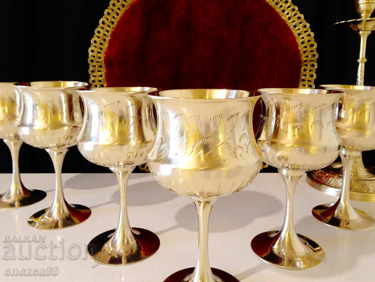 Auction Fantastic bronze service, wine glasses. Auction Fantastic bronze service, wine glasses.