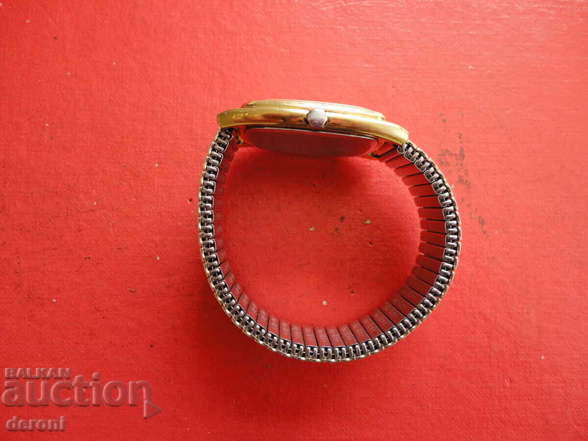 An amazing gold-plated Jonghans Quartz watch with price 180.00 BGN | € 92.03