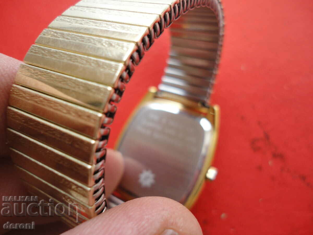 Delivery of An amazing gold-plated Jonghans Quartz watch