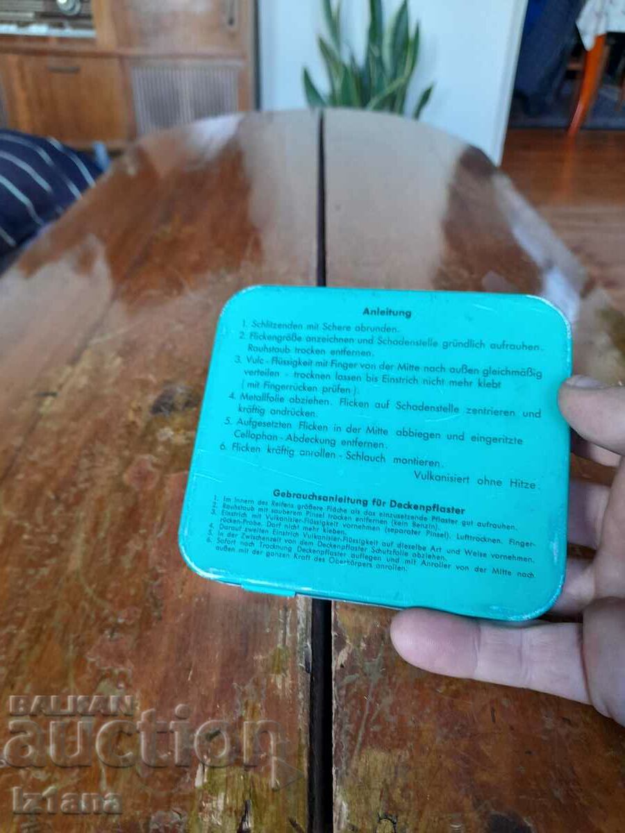 Auction  An old box of Tip Top tire patches