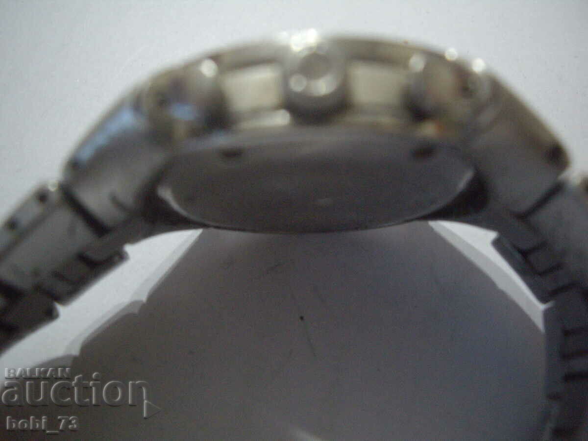 Delivery of Old working chronograph watch.