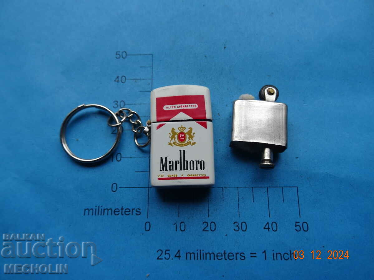 OLD ADVERTISING LIGHTER MARLBORO PETROL with price 11.00 BGN | € 5.62 OLD ADVERTISING LIGHTER MARLBORO PETROL with price 11.00 BGN | € 5.62