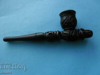 Ebony pipe, wood carving