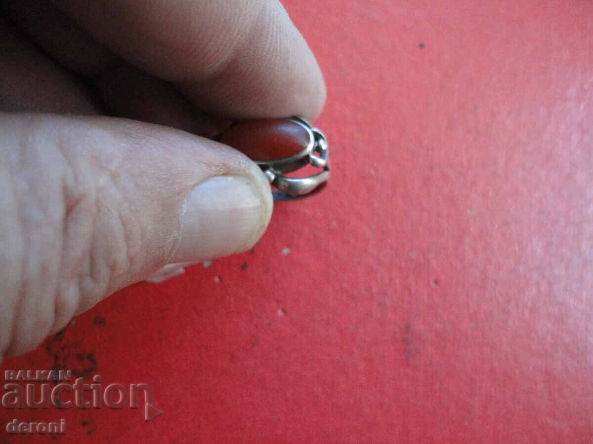 Silver ring with cornelian stone with price 50.00 BGN | € 25.56 Silver ring with cornelian stone with price 50.00 BGN | € 25.56