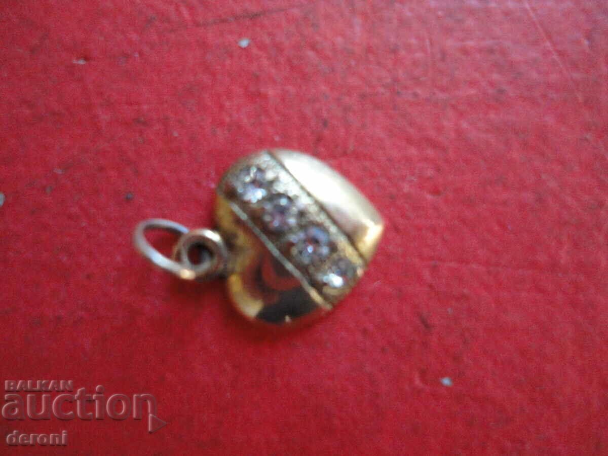 Gilded silver locket with stones with price 18.00 BGN | € 9.20 Gilded silver locket with stones with price 18.00 BGN | € 9.20