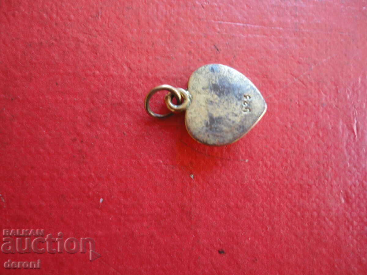 Auction Gilded silver locket with stones Auction Gilded silver locket with stones