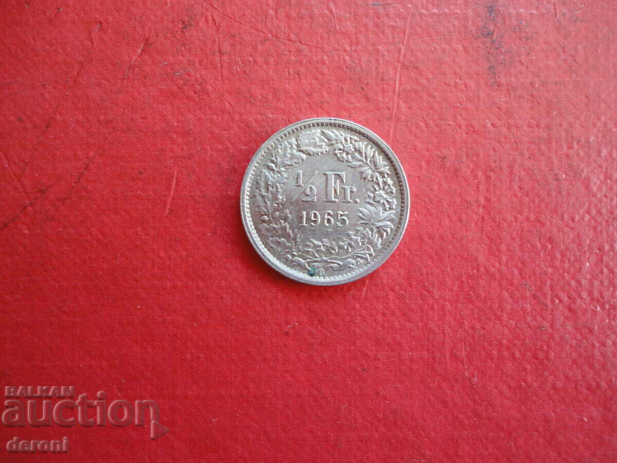 Moneda de argint 1/2 franc elvețian 1965 2 cu preț 10.00 BGN | € 5.11 Moneda de argint 1/2 franc elvețian 1965 2 cu preț 10.00 BGN | € 5.11