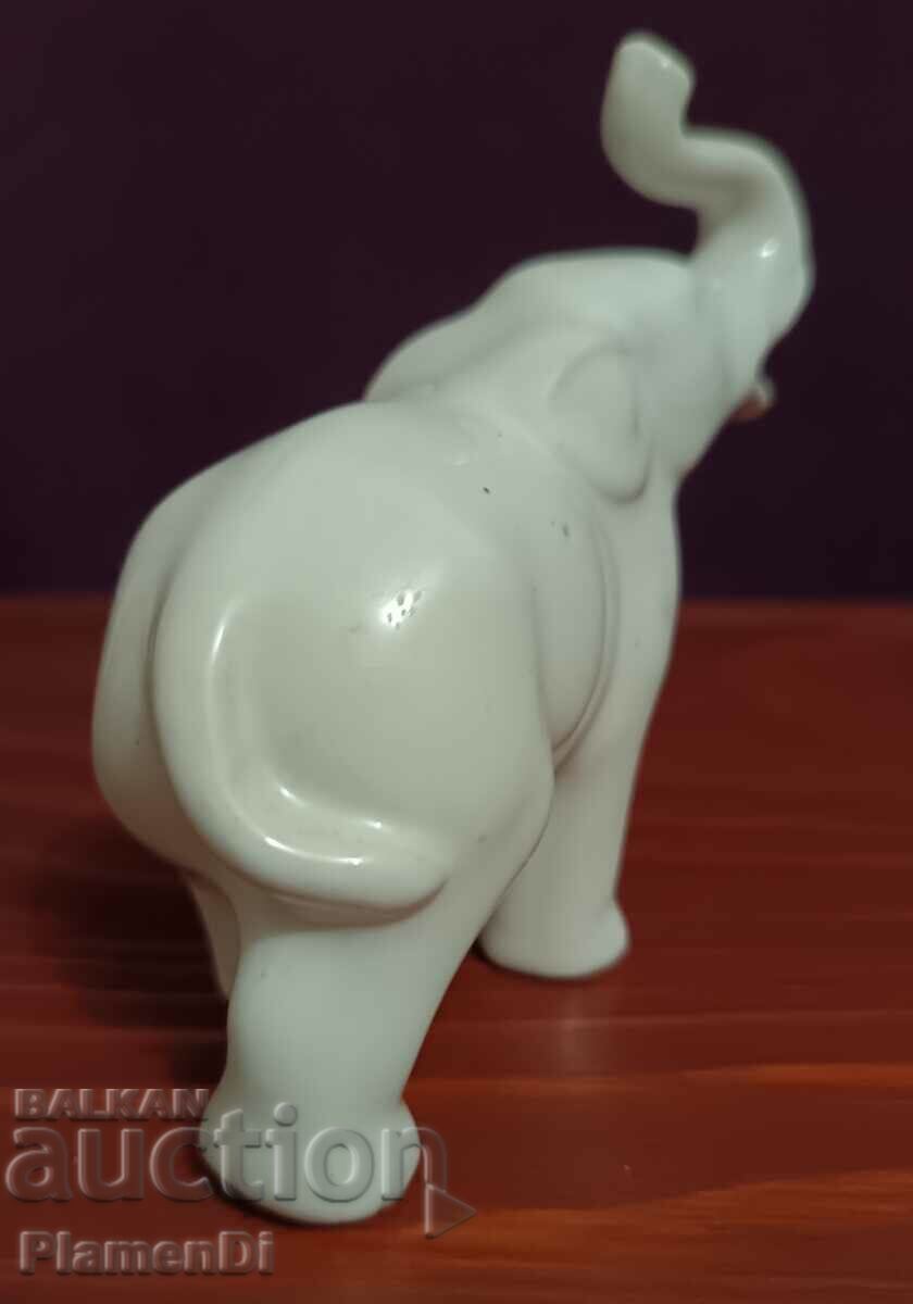 Porcelain figurine. with price 8.00 BGN | € 4.09 Porcelain figurine. with price 8.00 BGN | € 4.09