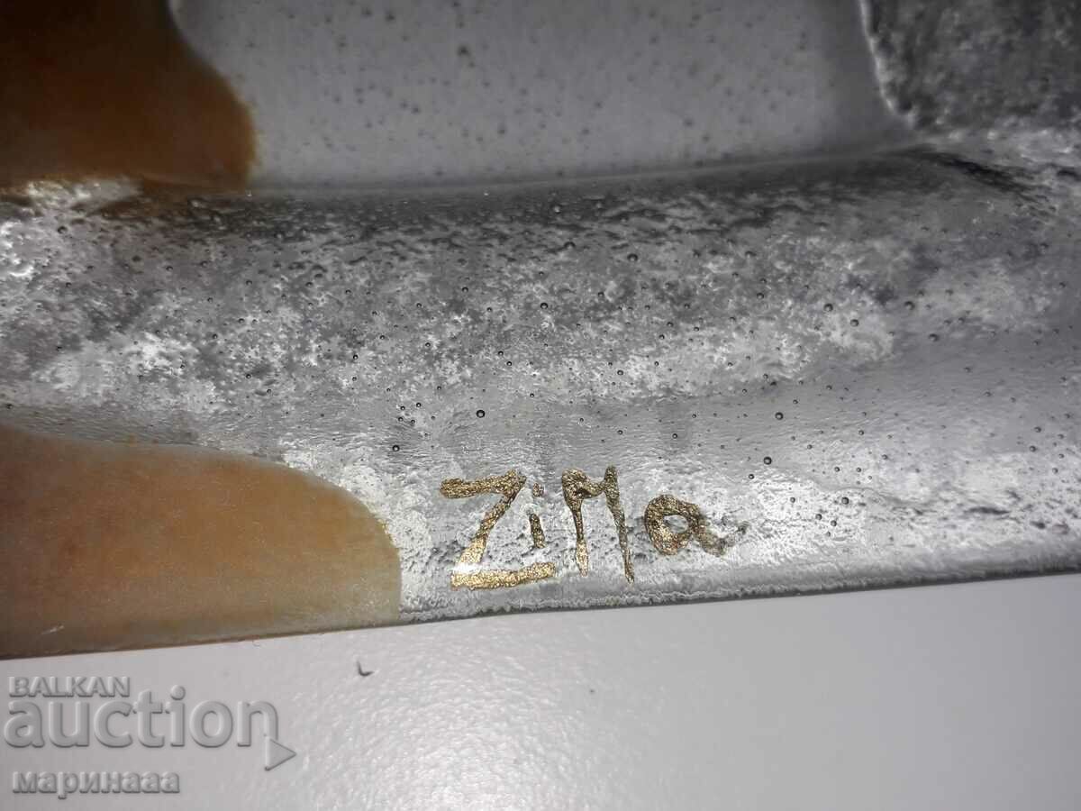 Delivery of DESIGNER CANDLESTICK WITH A PIECE OF GOLD