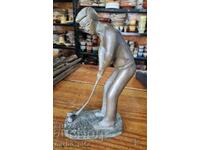 bronze golf player statuette