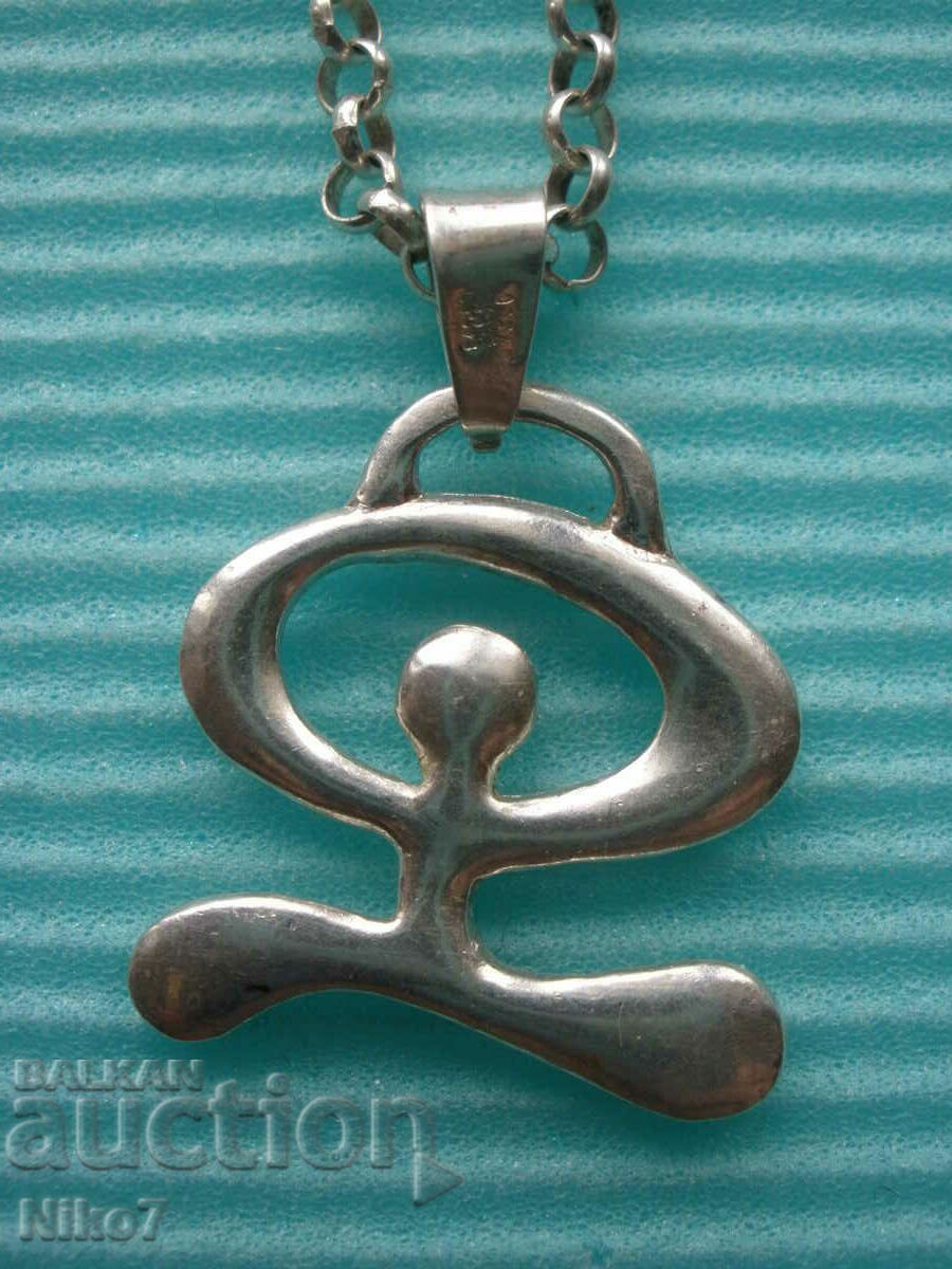 Delivery of Silver "Indalo" locket, pendant.