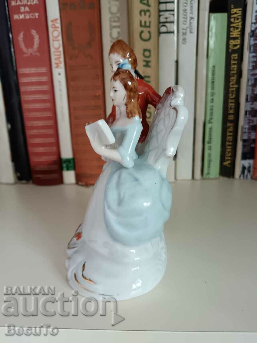 Delivery of Porcelain figurine of a lady with a book and a gentleman Delivery of Porcelain figurine of a lady with a book and a gentleman