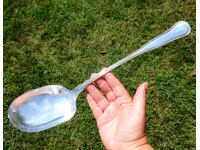 Antique silver plated brass ladle.