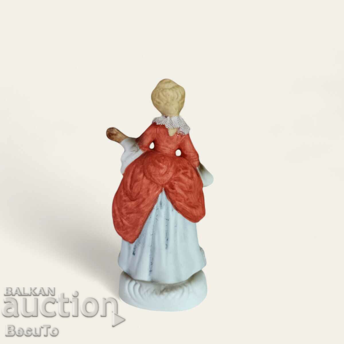 Porcelain figurine of a woman with a ukulele, lace, Germany with price 21.00 BGN | € 10.74 Porcelain figurine of a woman with a ukulele, lace, Germany with price 21.00 BGN | € 10.74