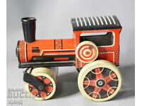 Old metal mechanical toy roller model