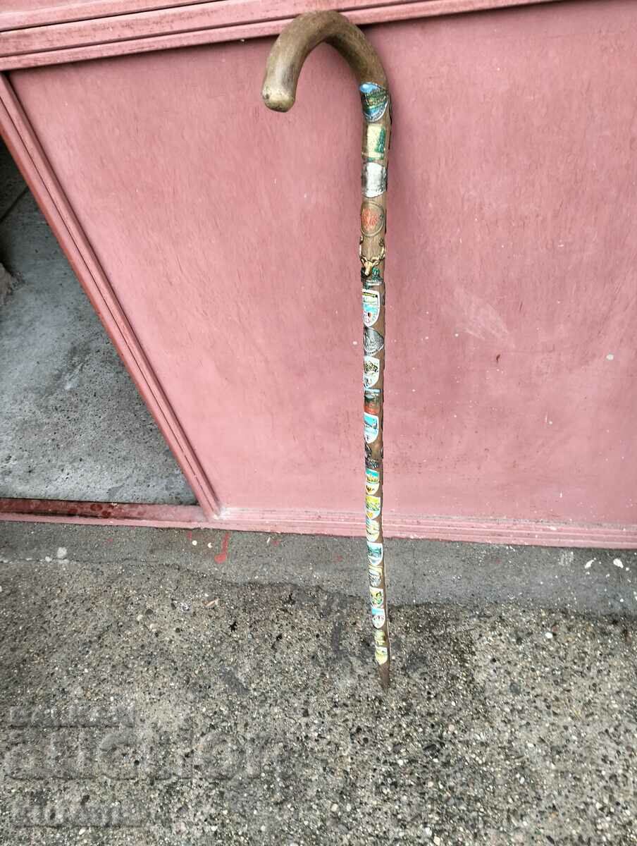 Delivery of A hiking cane with many badges Delivery of A hiking cane with many badges