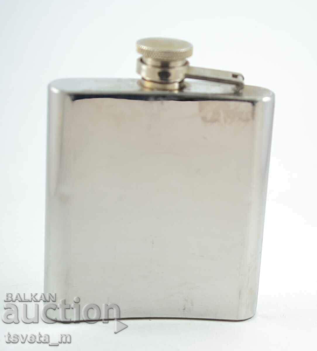 Auction  Metal Liquor Bottle Lionking