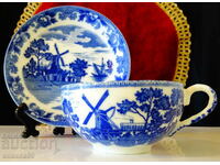 Delft style Japanese porcelain cup and saucer.