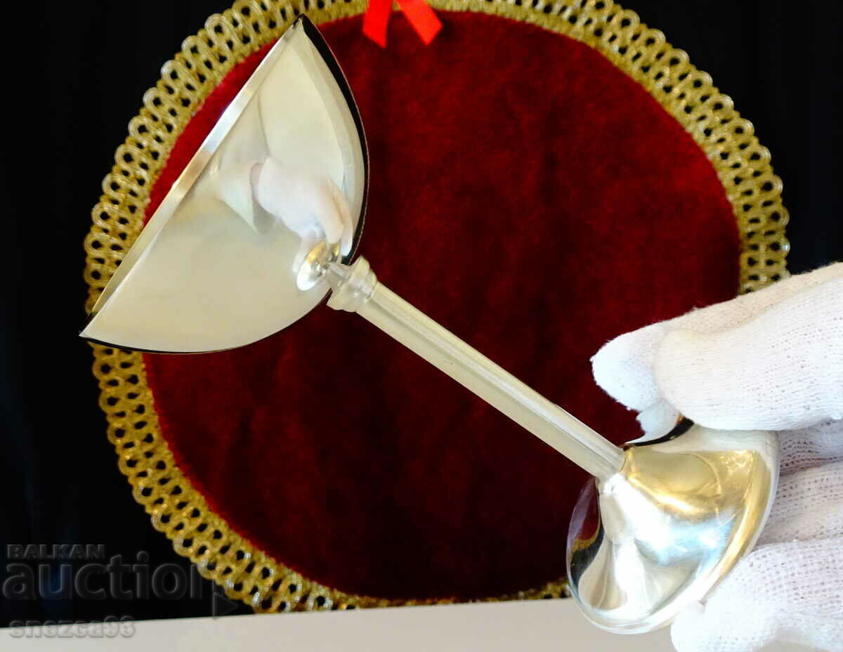 Auction Antique silver-plated cup on a stand, bronze Auction Antique silver-plated cup on a stand, bronze