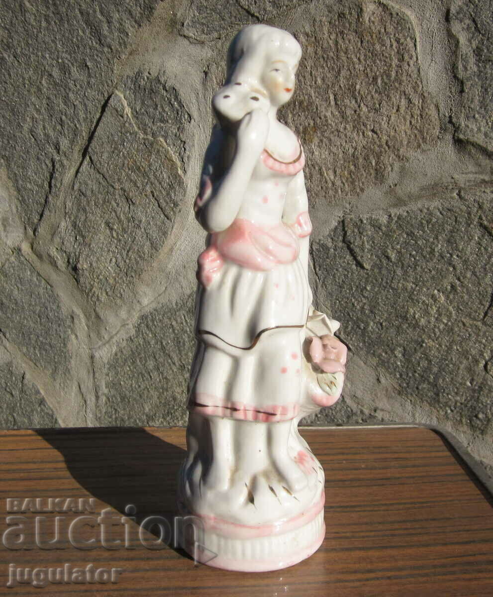 Auction Old porcelain figure statuette woman with a basket of roses Auction Old porcelain figure statuette woman with a basket of roses