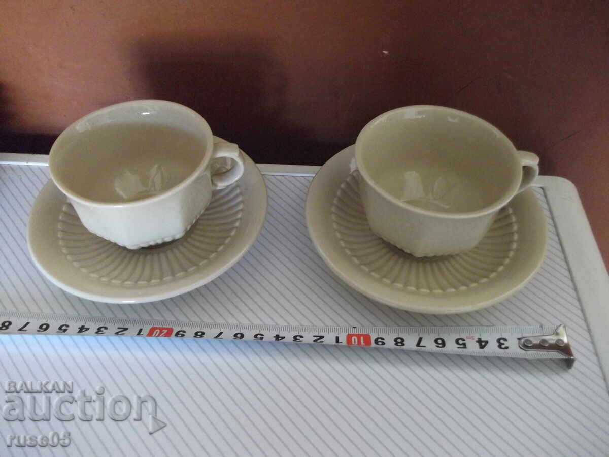 Auction Lot of 2 pcs. cups and 5 pcs. porcelain coffee saucers Auction Lot of 2 pcs. cups and 5 pcs. porcelain coffee saucers