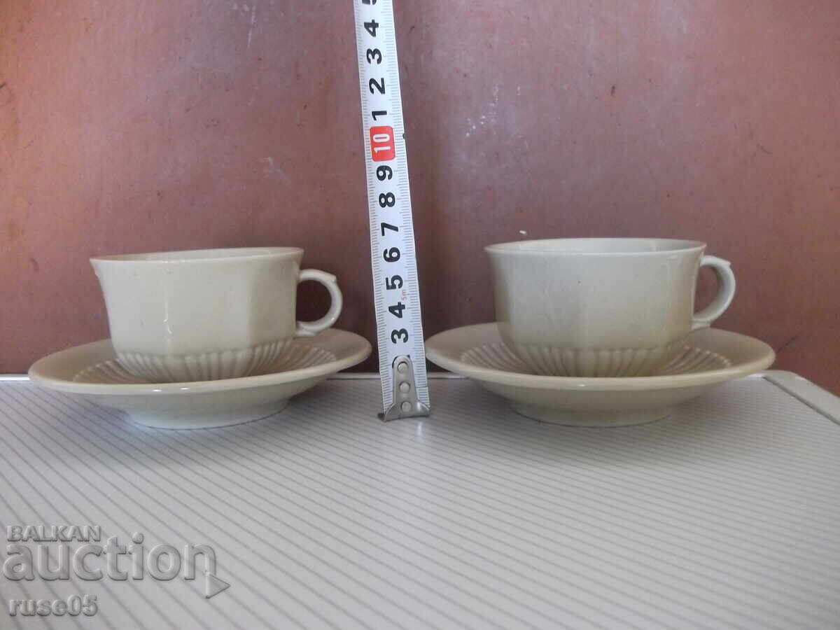 Lot of 2 pcs. cups and 5 pcs. porcelain coffee saucers - 5 Lot of 2 pcs. cups and 5 pcs. porcelain coffee saucers - 5