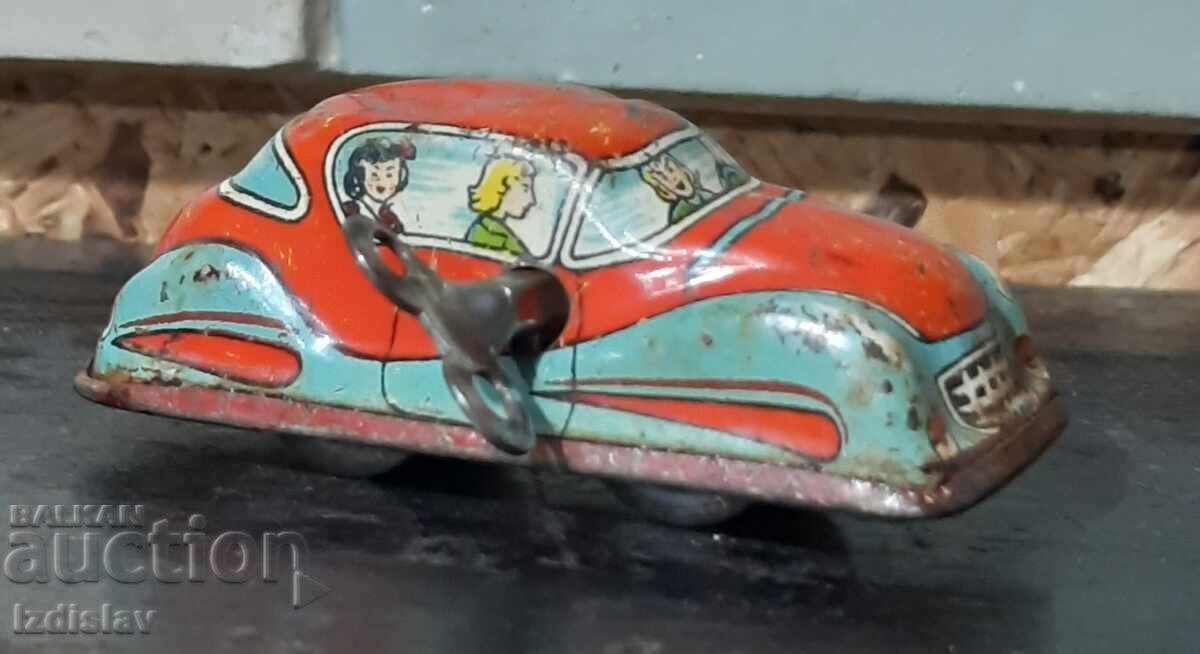 An old tin toy with price 25.00 BGN | € 12.78 An old tin toy with price 25.00 BGN | € 12.78