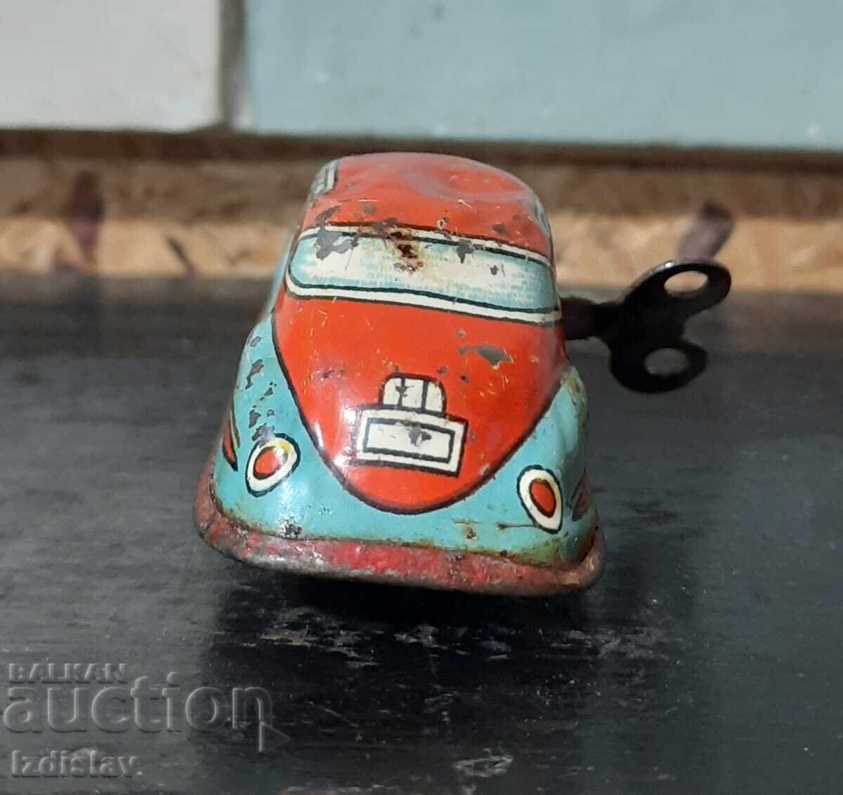 Delivery of An old tin toy Delivery of An old tin toy