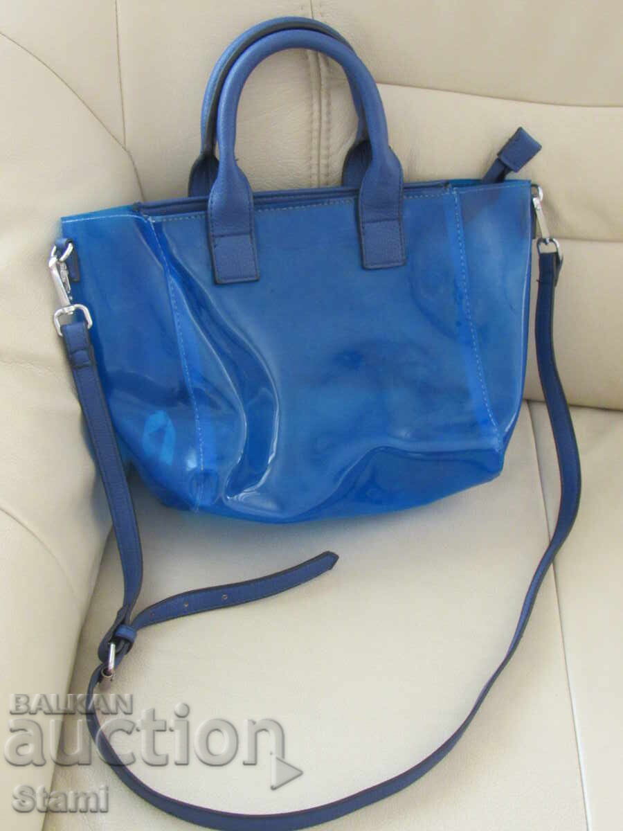 Blue silicone handbag with price 15.00 BGN | € 7.67 Blue silicone handbag with price 15.00 BGN | € 7.67