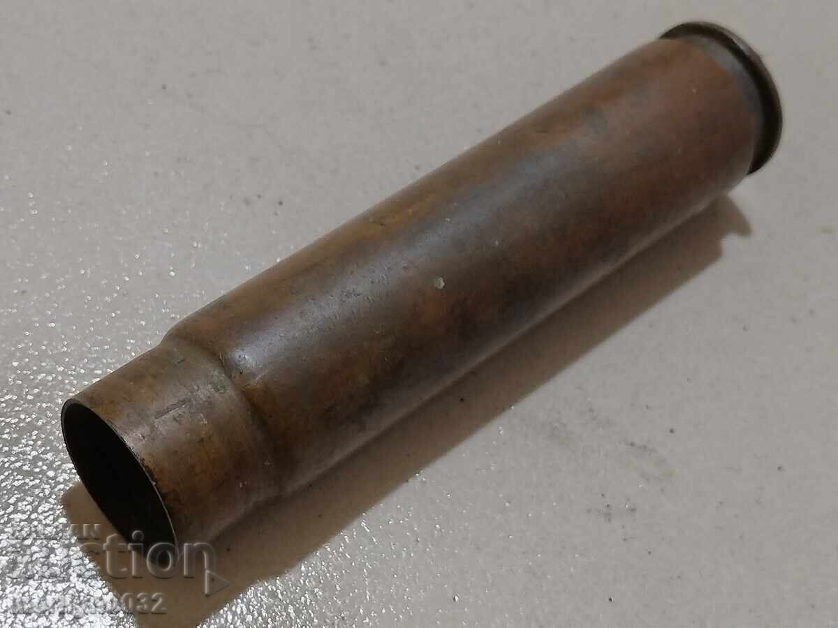 Auction Case from a large-caliber machine gun, ammunition, cartridge Auction Case from a large-caliber machine gun, ammunition, cartridge