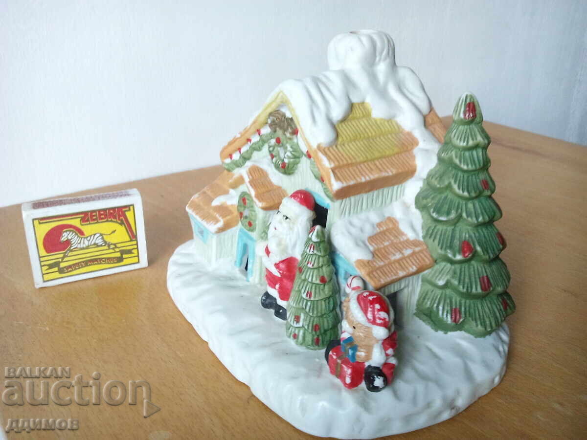 Порцеланова коледна къщичка със свещ с цена 15.00 лв. | € 7.67 Порцеланова коледна къщичка със свещ с цена 15.00 лв. | € 7.67