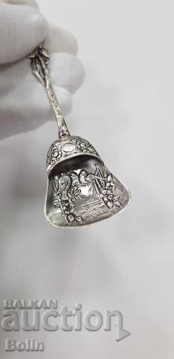 Delivery of Beautiful silver European spoon with birds and flowers 800 BC. Delivery of Beautiful silver European spoon with birds and flowers 800 BC.