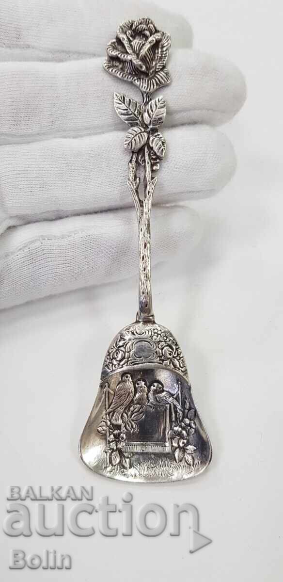 Beautiful silver European spoon with birds and flowers 800 BC. Beautiful silver European spoon with birds and flowers 800 BC.