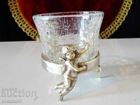 Bronze candlestick, glass with angels.