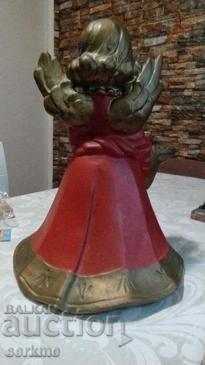Auction  Angel candlestick large 32cm.