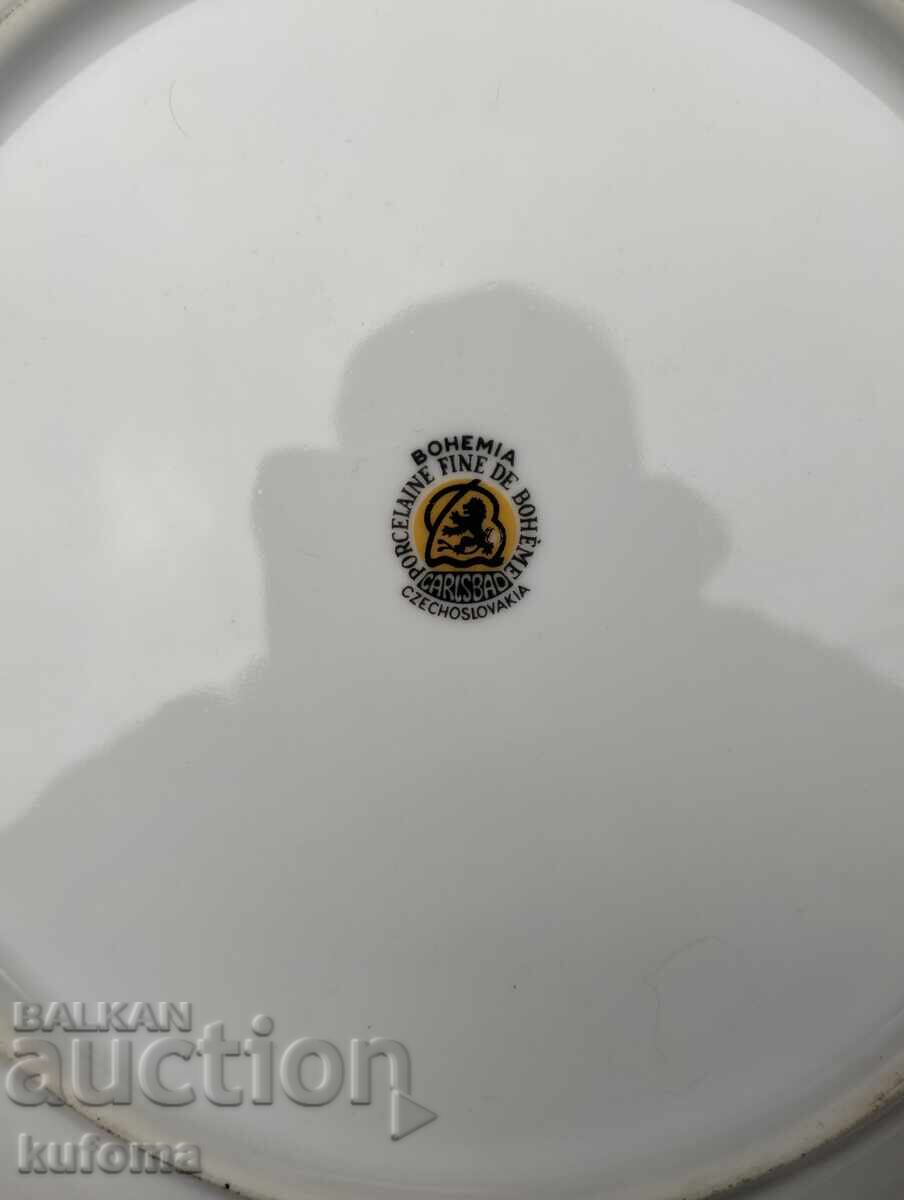 Auction Porcelain wall plate with gilding Auction Porcelain wall plate with gilding