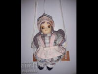 SMALL DOLL. CERAMICS, TEXTILE, WOOD